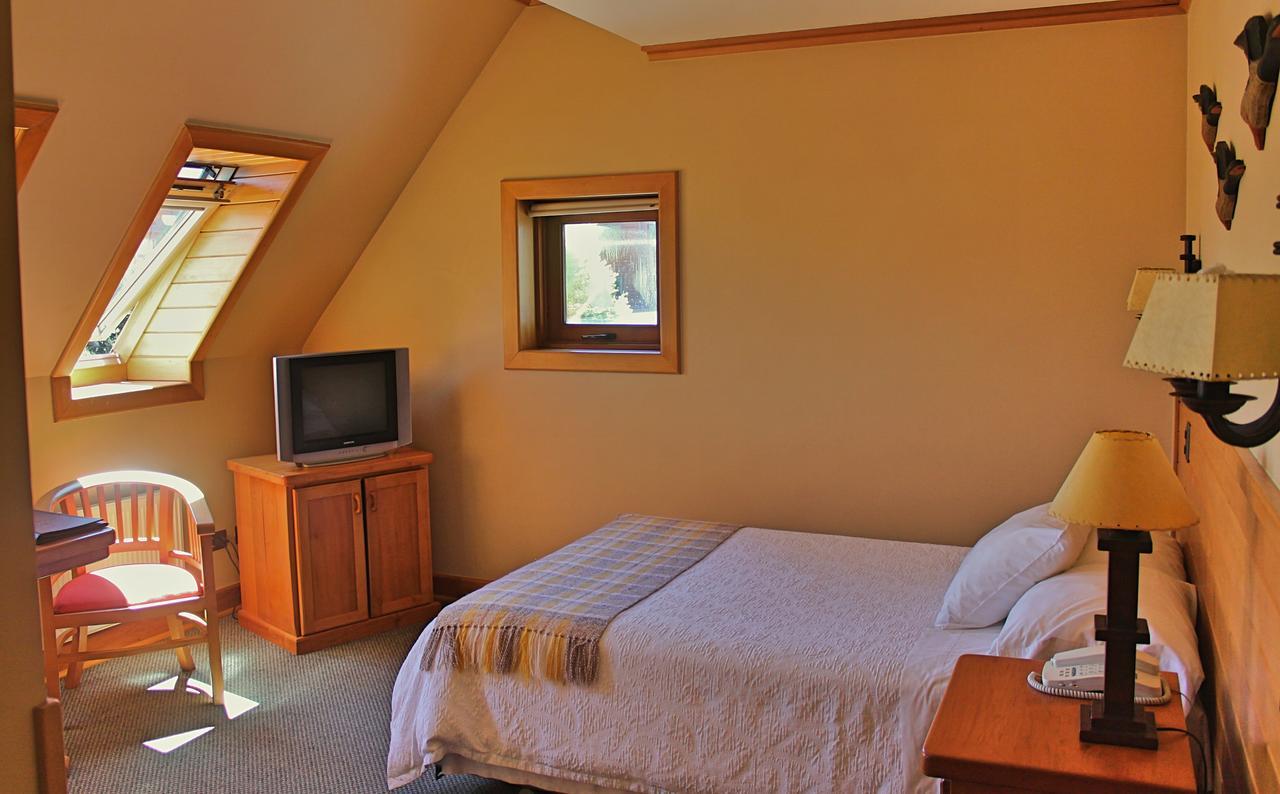 Hotel Puelche Пуэрто-Варас Номер фото